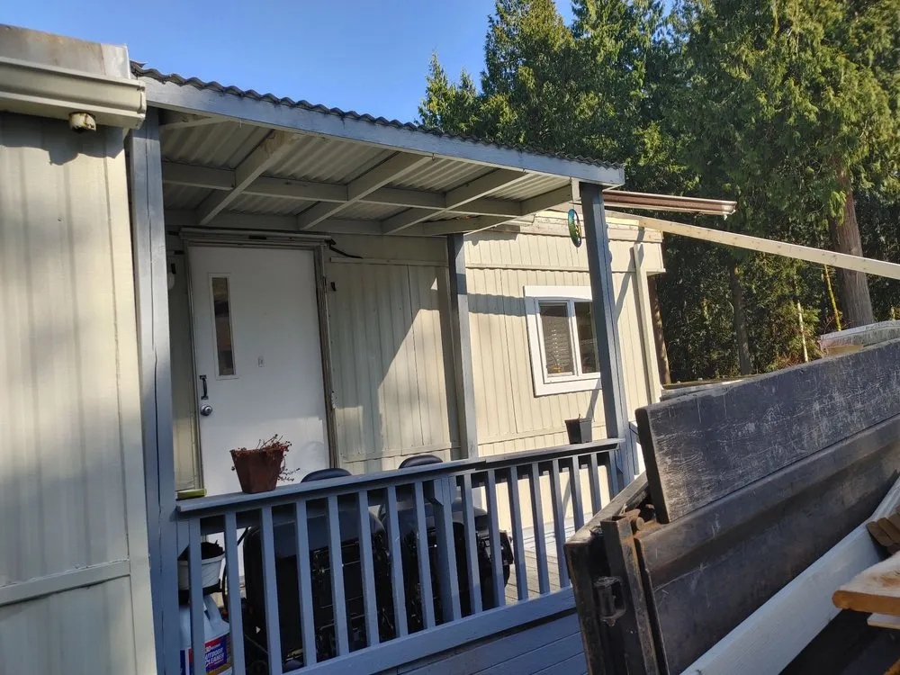 Slide of M and J's Roofing