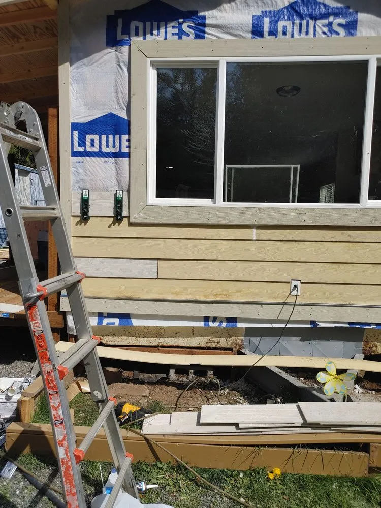 Slide of M and J's Roofing