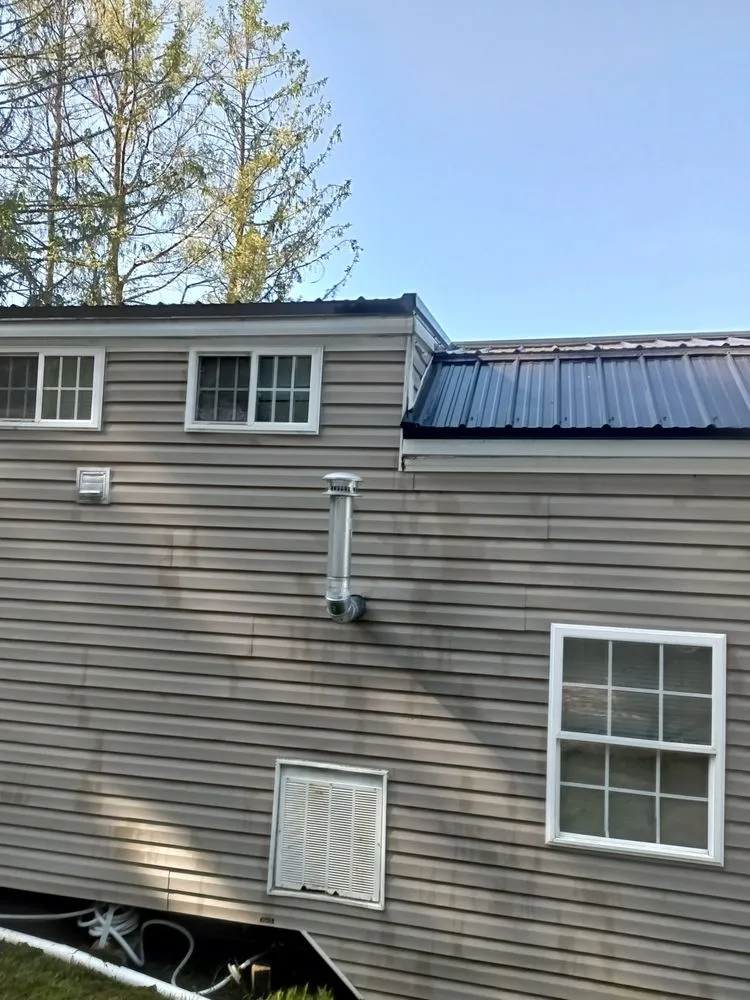 Slide of M Best Pressure washing and camp roof coating