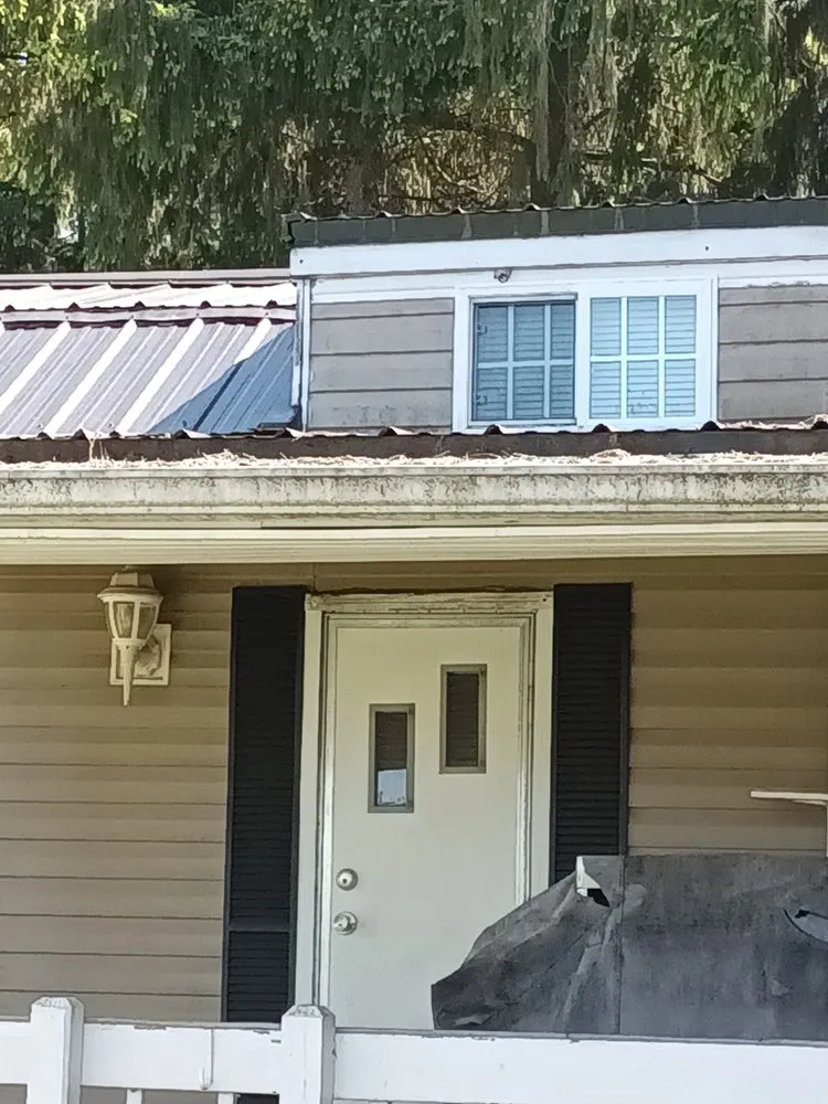 Slide of M Best Pressure washing and camp roof coating