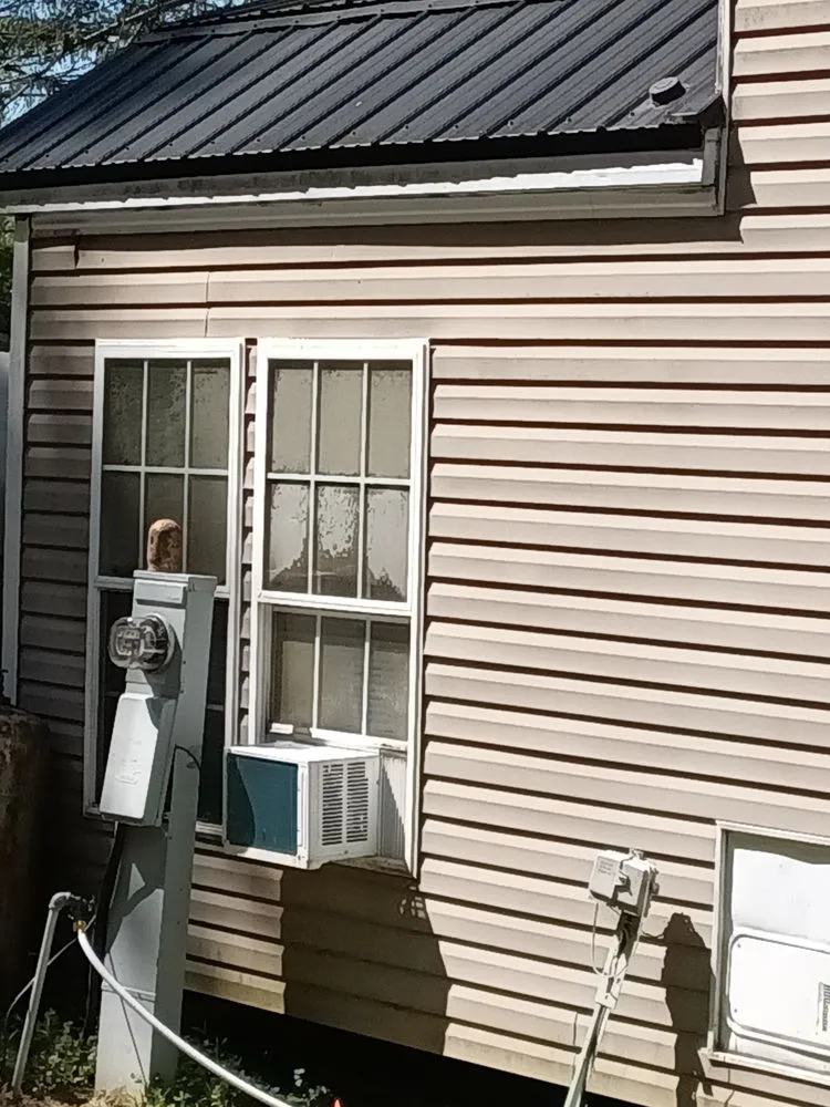 Slide of M Best Pressure washing and camp roof coating