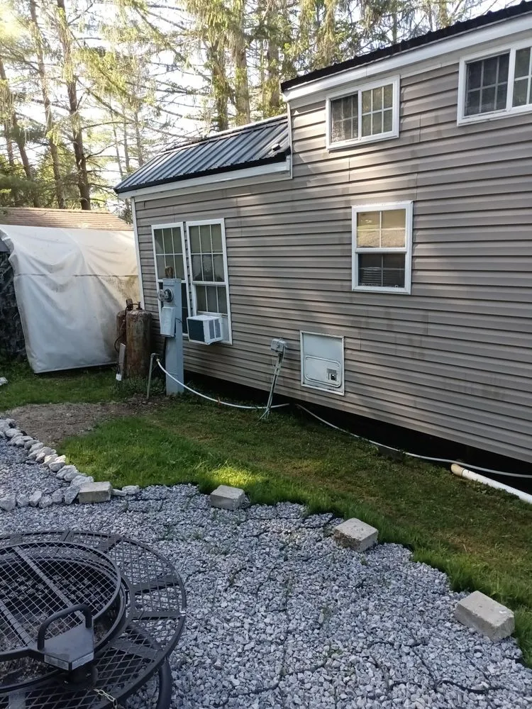 Slide of M Best Pressure washing and camp roof coating