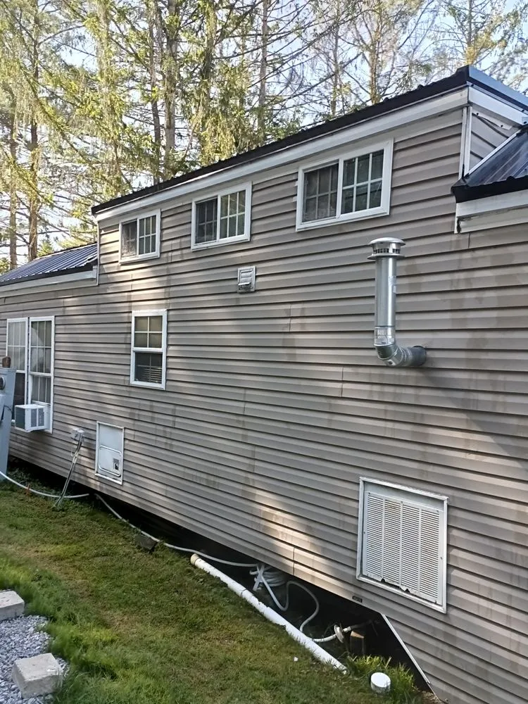 Slide of M Best Pressure washing and camp roof coating