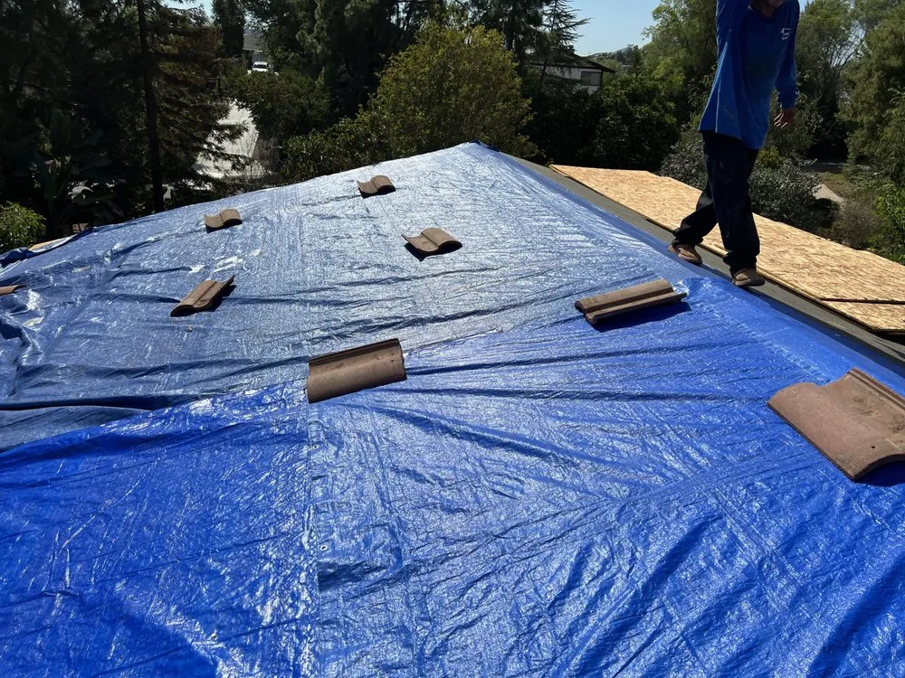 Slide of M G Roofing