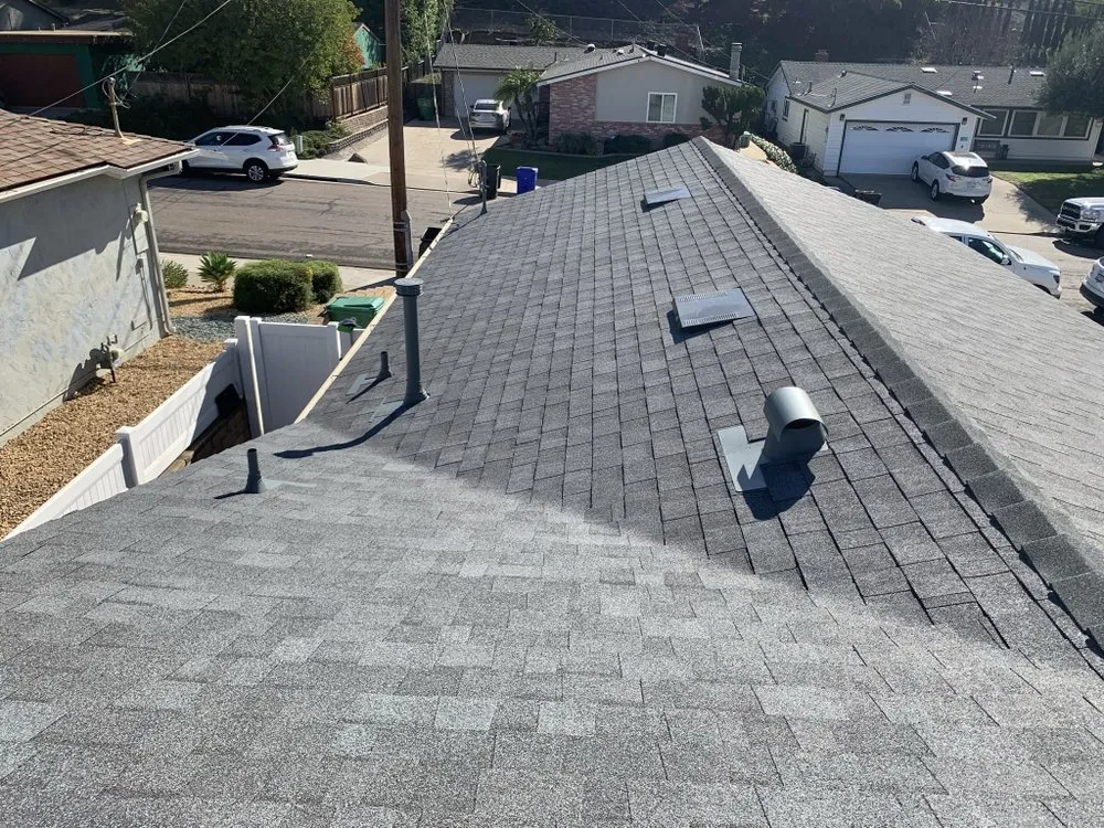 Slide of M G Roofing