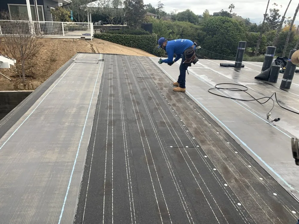 Slide of M G Roofing