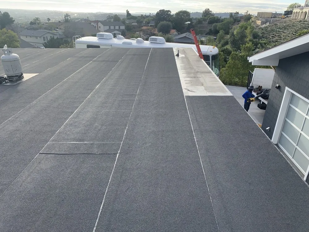 Slide of M G Roofing