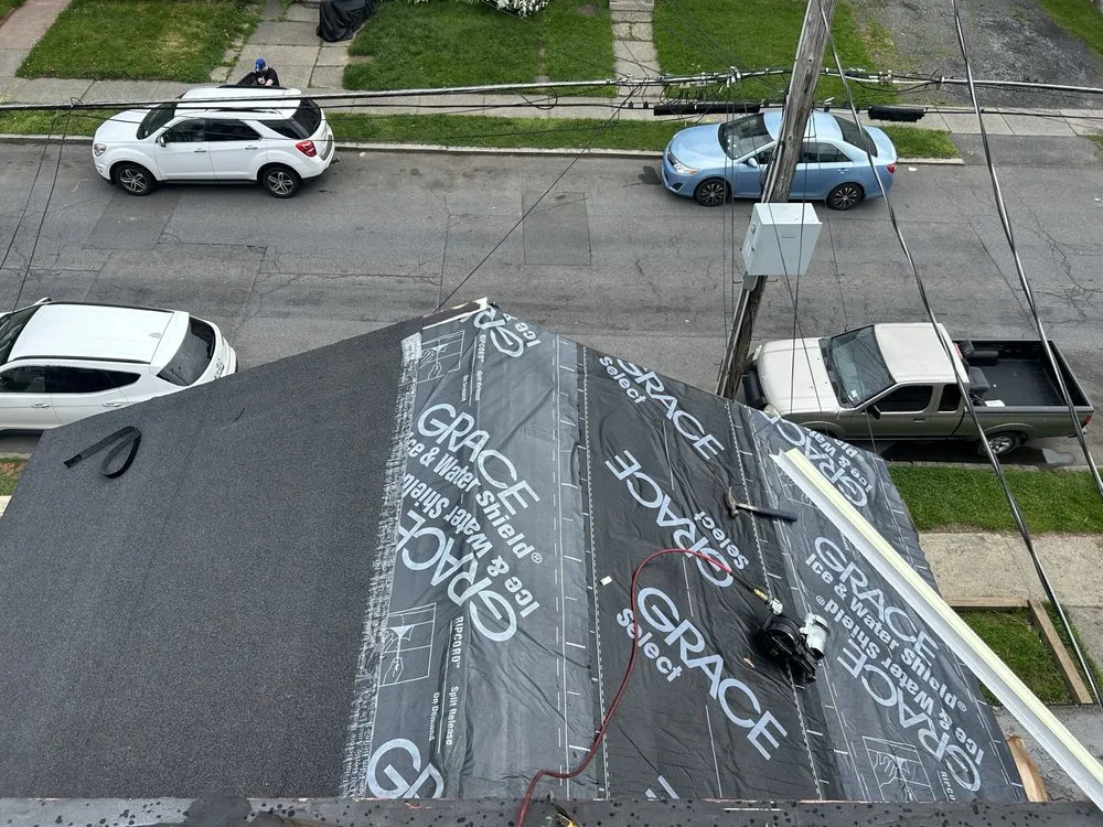 Slide of M Grady Roofing