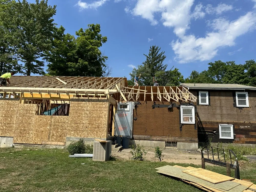 Slide of M Grady Roofing