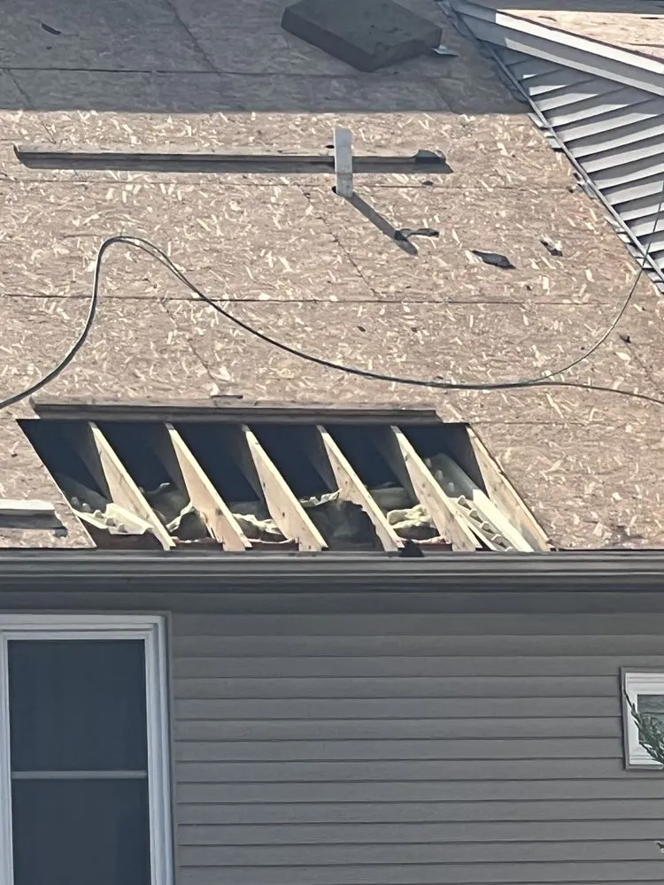 Slide of M Mac Exteriors