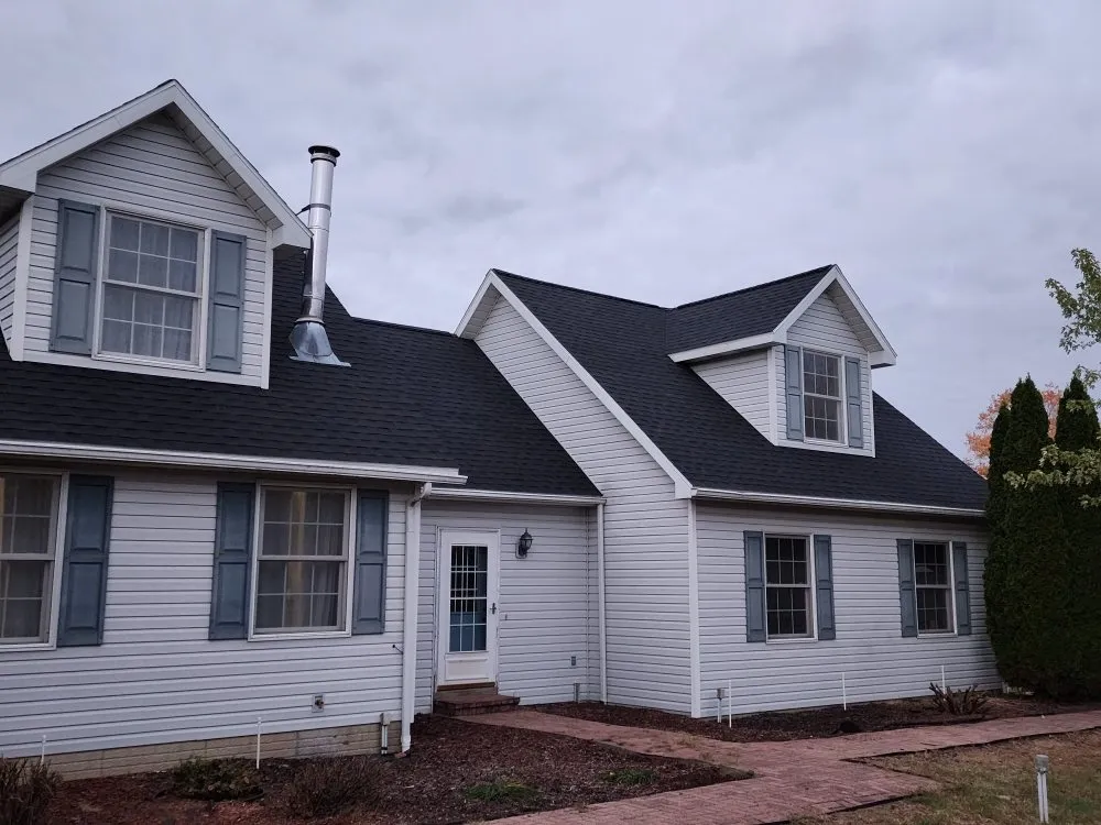 Local metal roofing installation for homes in Concord, MI by M W Roofing