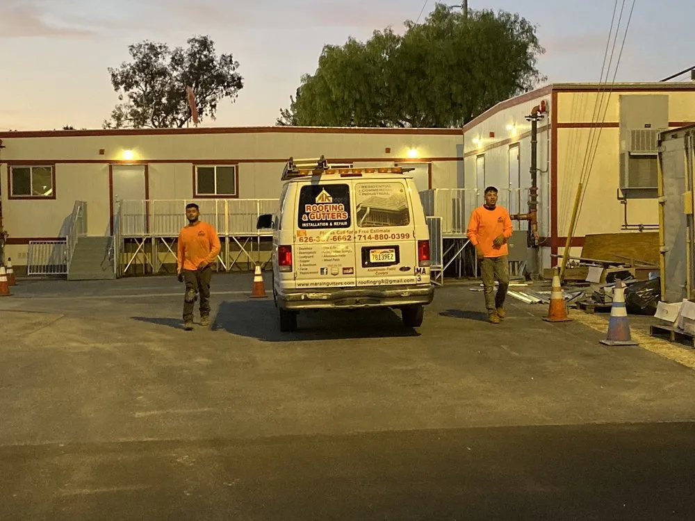 Slide of MA Rain Gutters