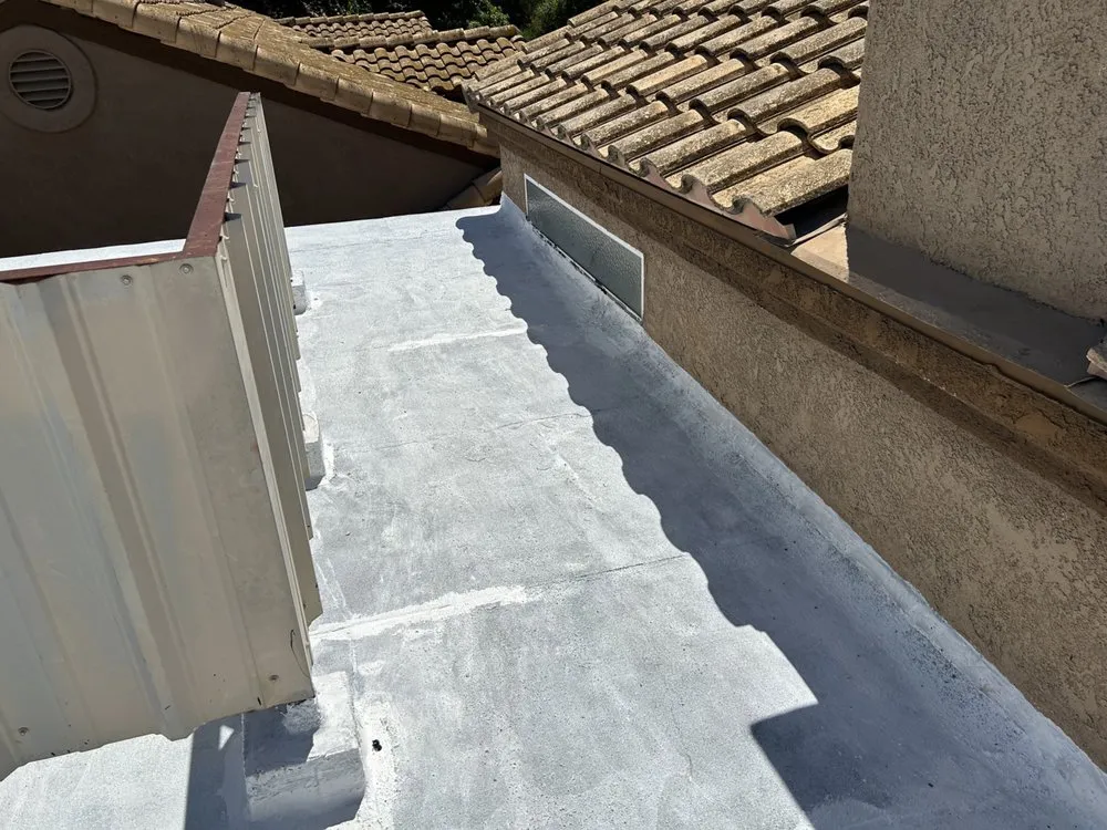 Slide of MA Rain Gutters