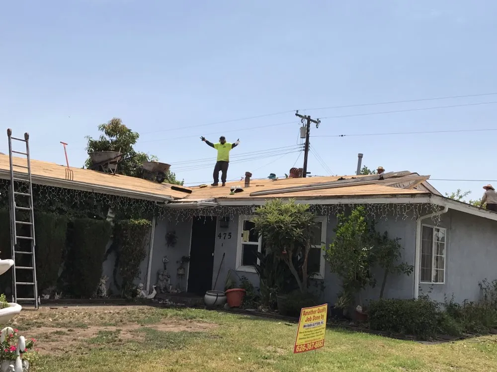 Slide of MA Rain Gutters