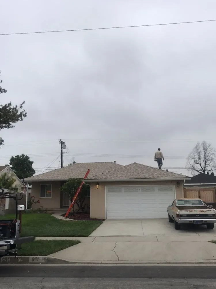 Slide of MA Roofing and Gutters