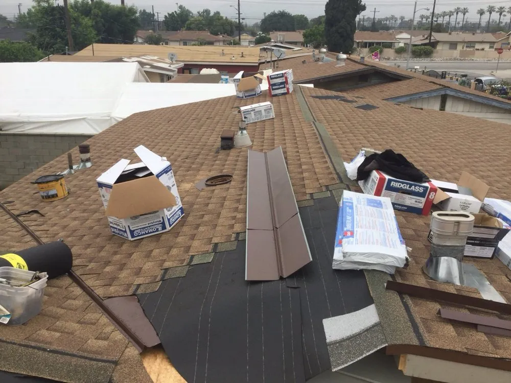 Slide of MA Roofing and Gutters