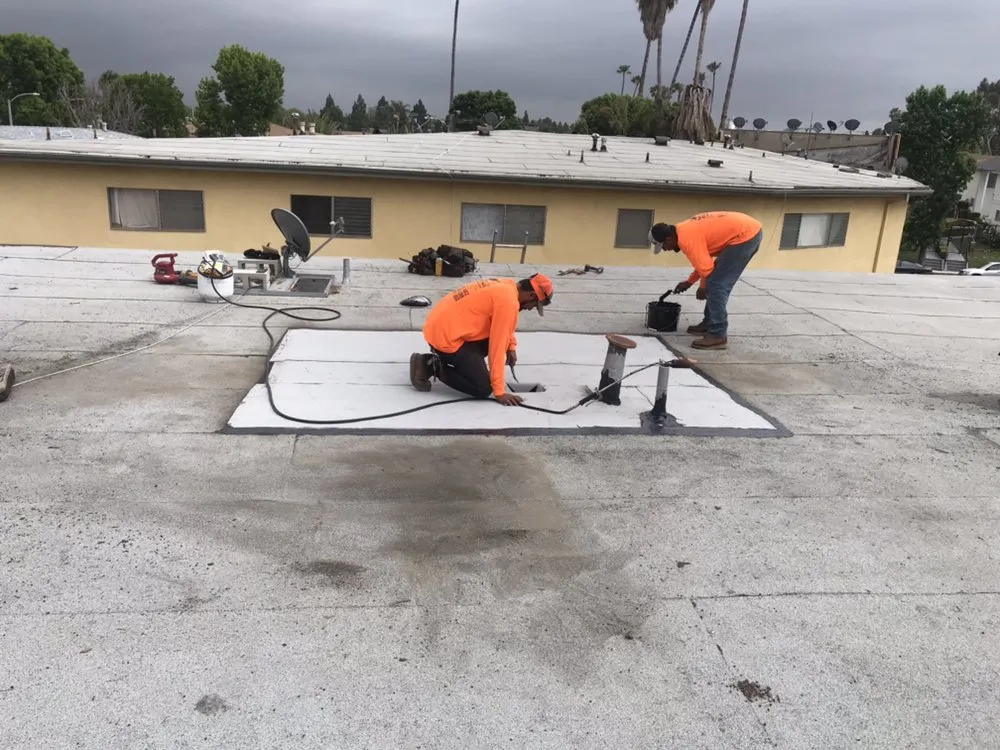 Slide of MA Roofing and Gutters