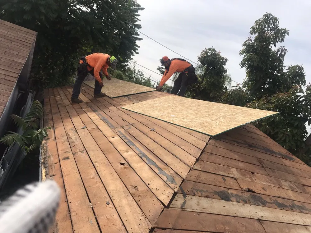 Slide of MA Roofing and Gutters