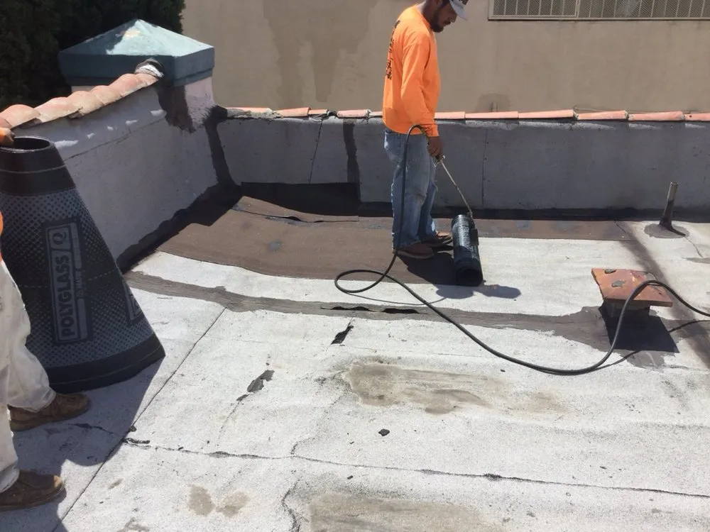 Slide of MA Roofing and Gutters