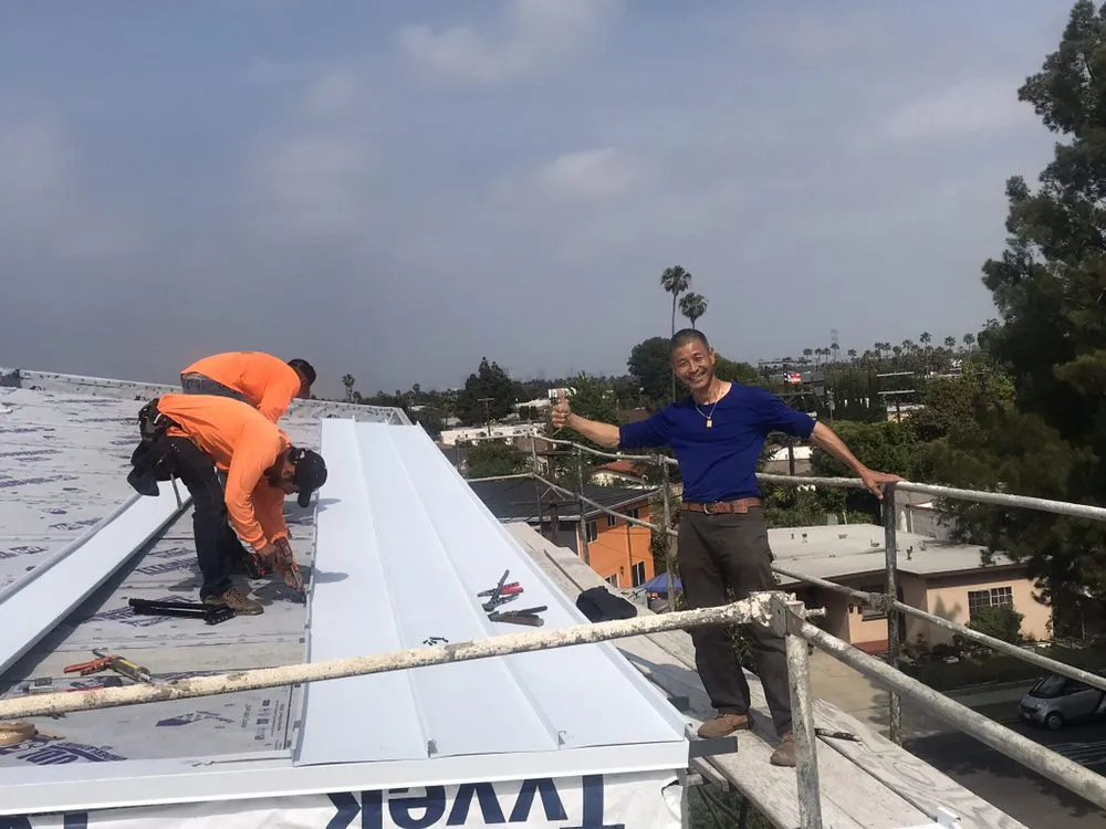 Slide of MA Roofing and Gutters