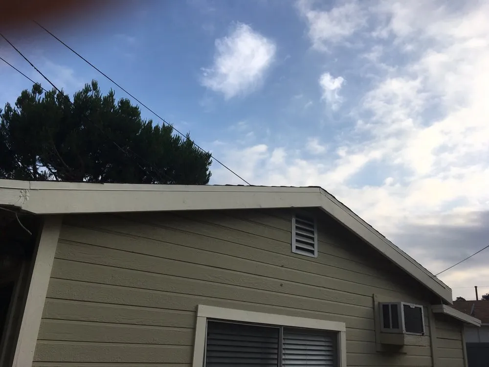 Slide of MA Roofing and Gutters