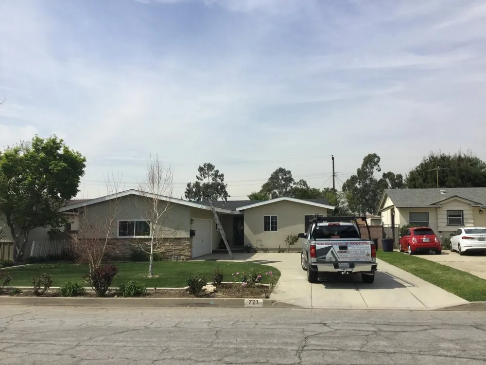 Slide of MA Roofing and Gutters