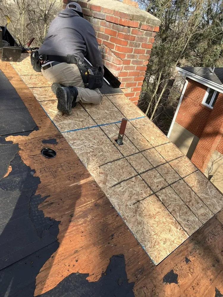 Slide of MA Thompson Roofing