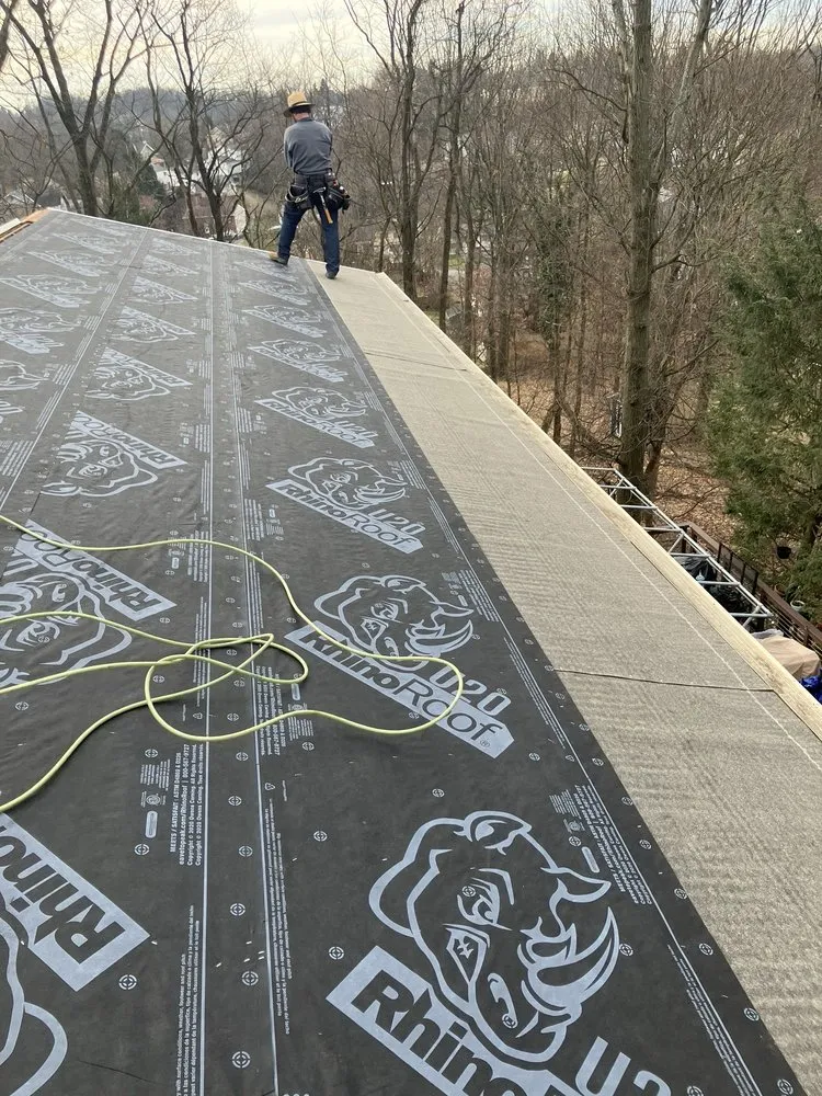 Slide of MA Thompson Roofing