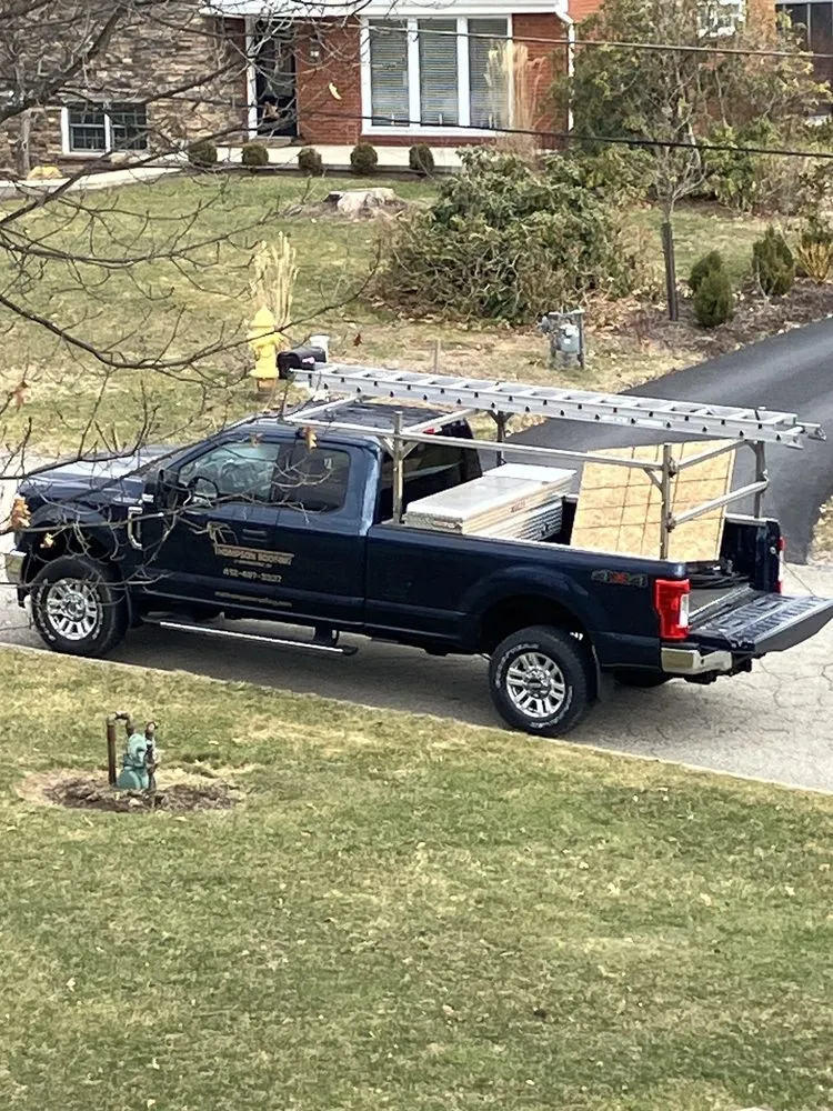 Slide of MA Thompson Roofing