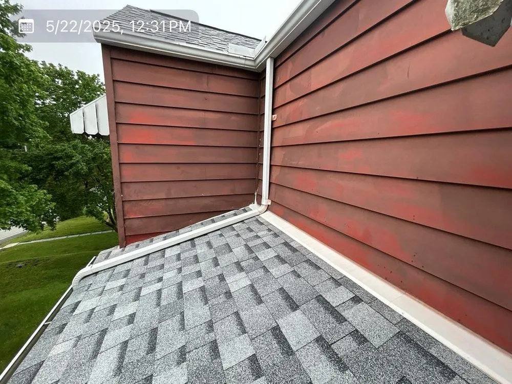 Slide of MA Thompson Roofing