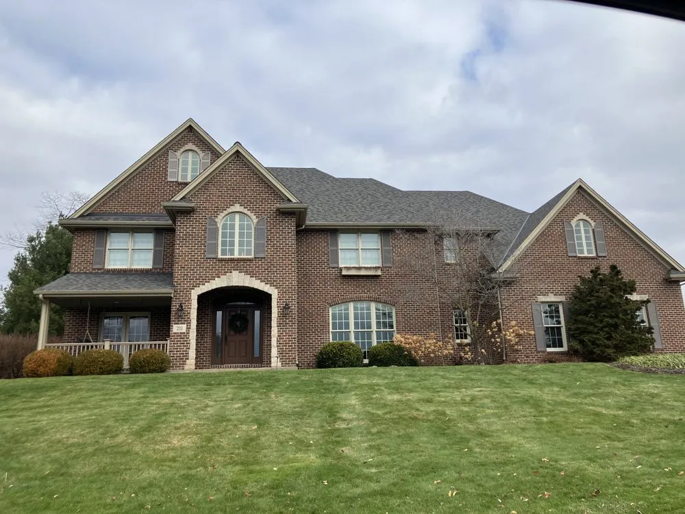 Slide of MA Thompson Roofing