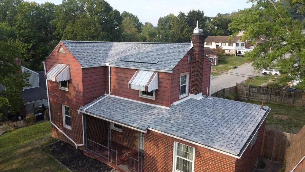 Slide of MA Thompson Roofing