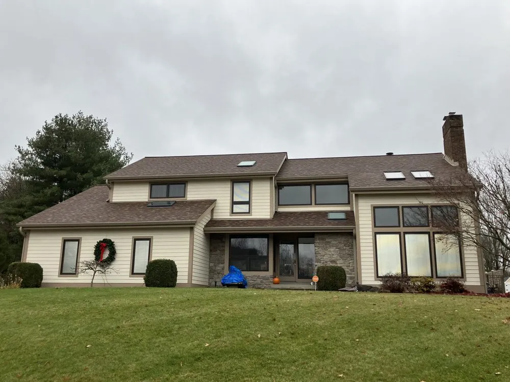 Slide of MA Thompson Roofing