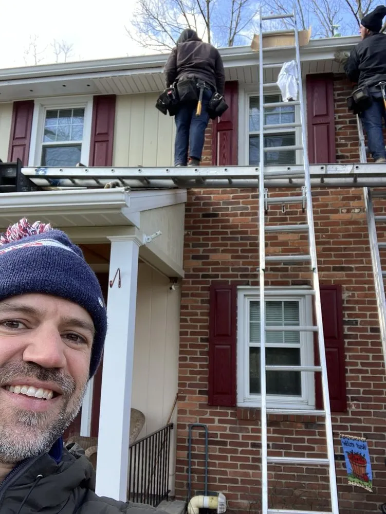 Slide of MA Thompson Roofing