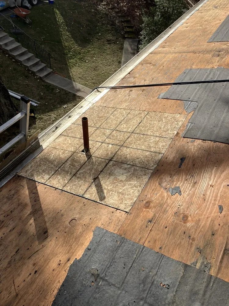 Slide of MA Thompson Roofing