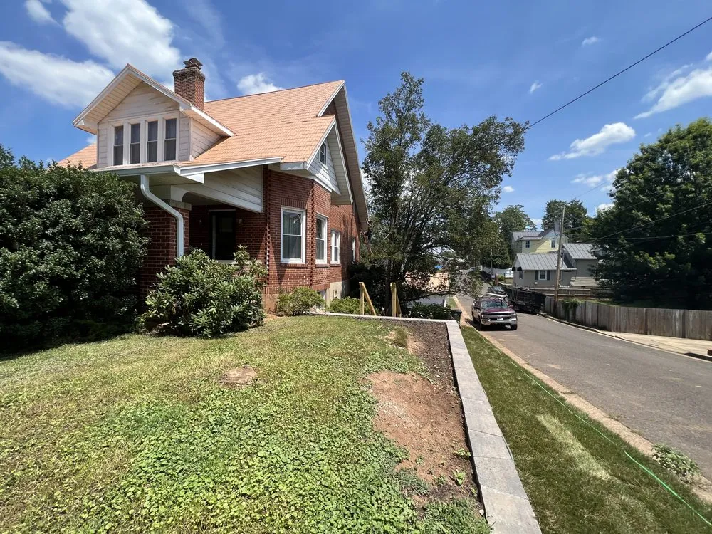 Slide of Macbeth Roofing and Exteriors