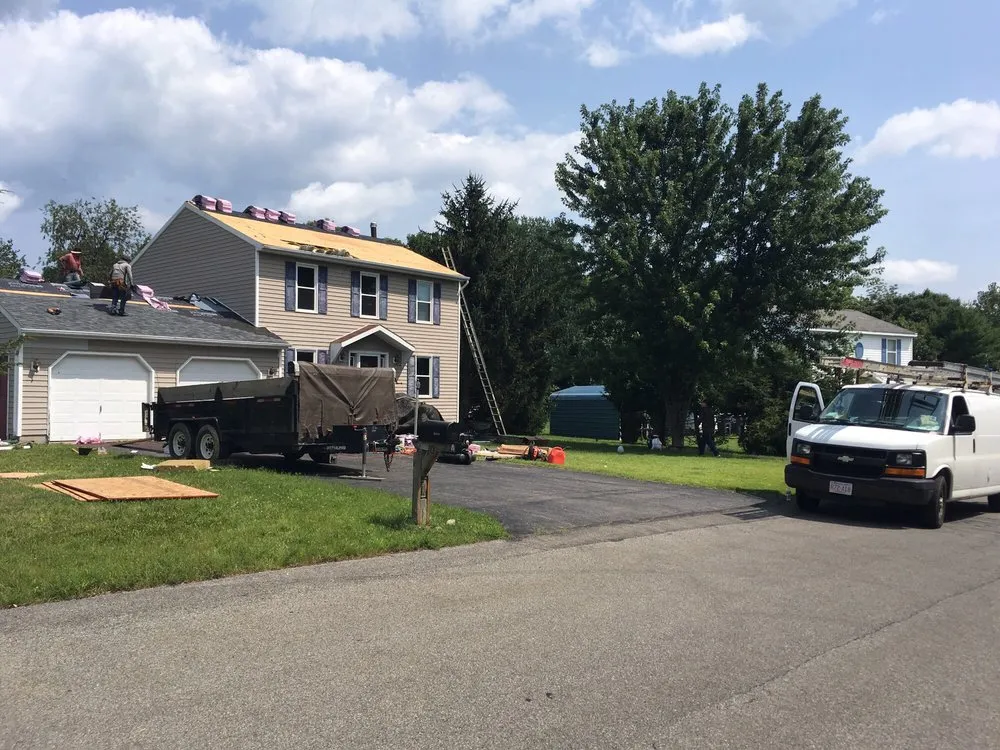 Slide of MACC Roofing