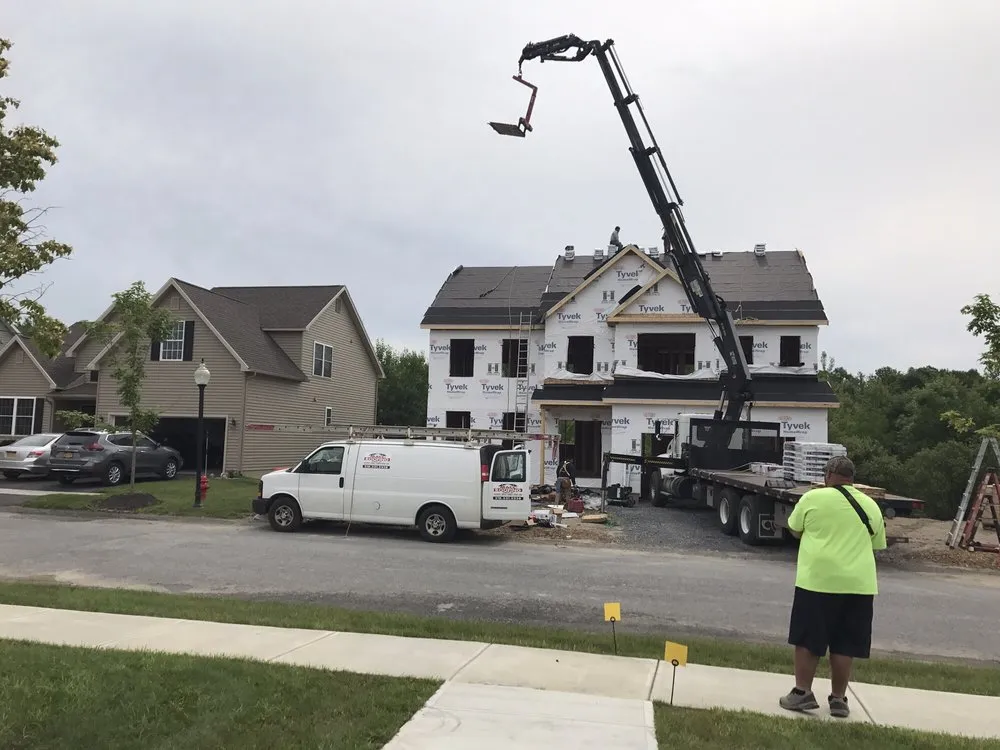 Slide of MACC Roofing