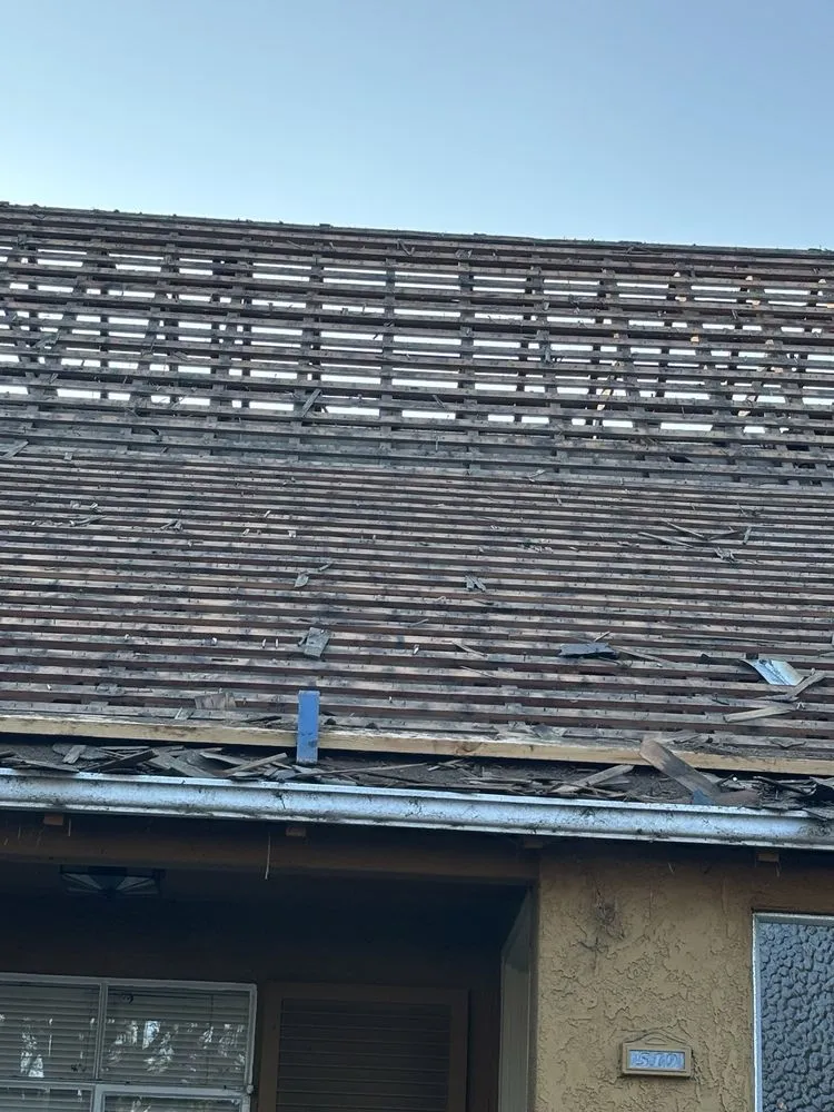 Slide of Maciel Roofing Construction