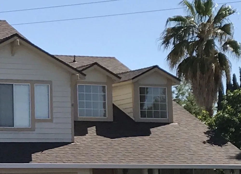 Slide of Maciel Roofing Construction