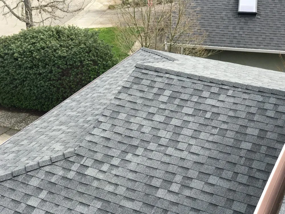 Slide of Maciel Roofing Construction