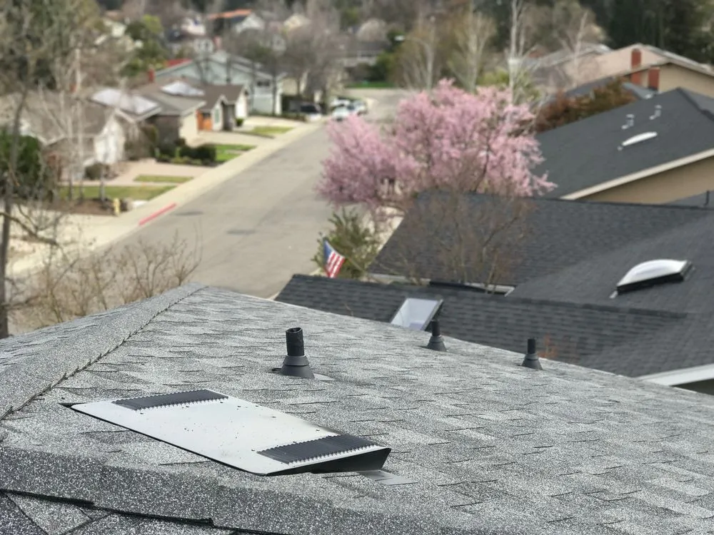 Slide of Maciel Roofing Construction