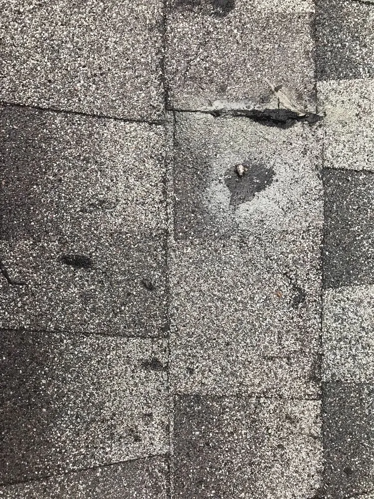 Slide of Mackel Roofing Company