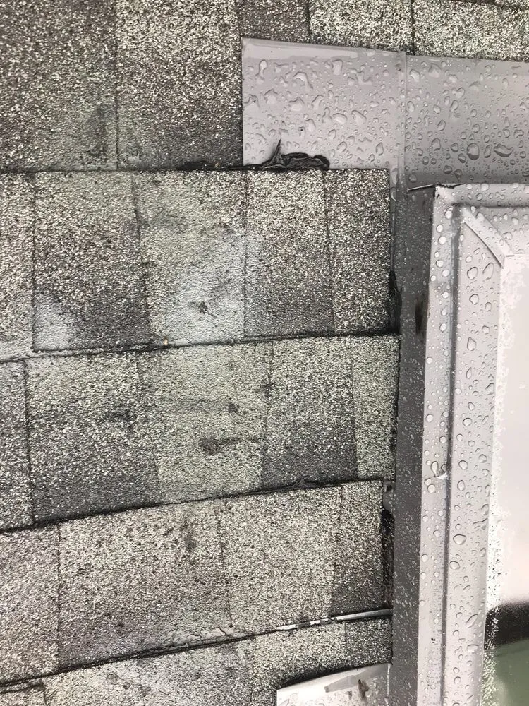 Slide of Mackel Roofing Company