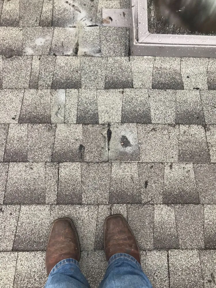 Slide of Mackel Roofing Company