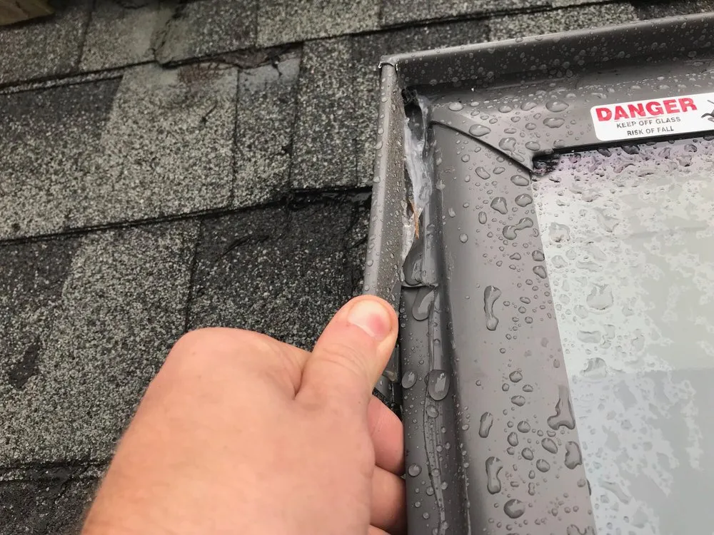 Slide of Mackel Roofing Company