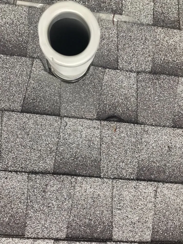 Slide of Mackel Roofing Company