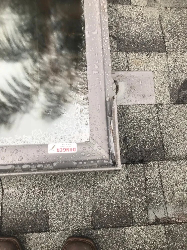 Slide of Mackel Roofing Company