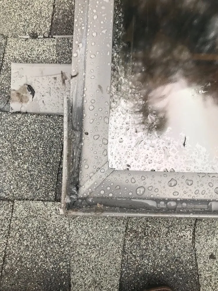 Slide of Mackel Roofing Company