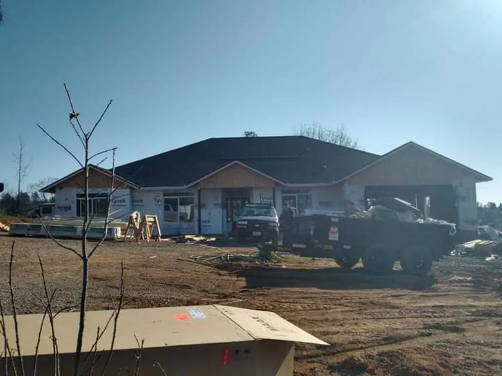 Slide of Mackney Roofing